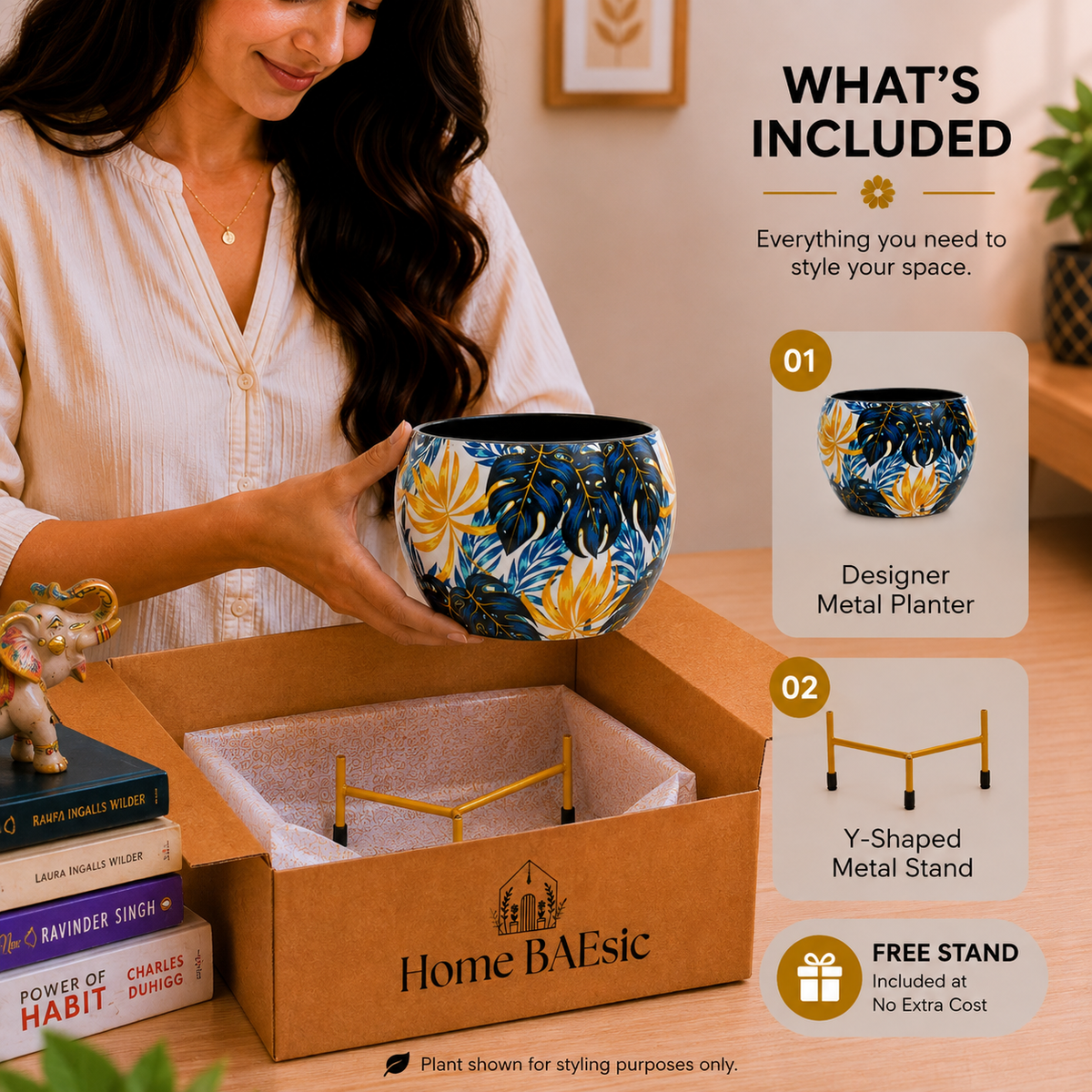 A woman holds a decorative blue metal planter with yellow and white floral patterns above an open cardboard box labeled Home BAEsic, with included accessories and a 'What's Included' graphic on the right.