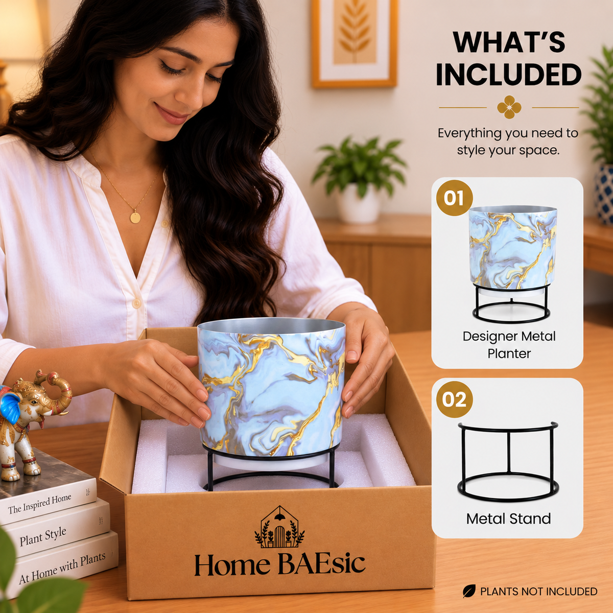 Home BAEsic Blue and Gold Marble designer metal tumbler planter with black metal stand shown inside an open box during unboxing, with a woman gently touching the planter and “What’s Included” callouts.