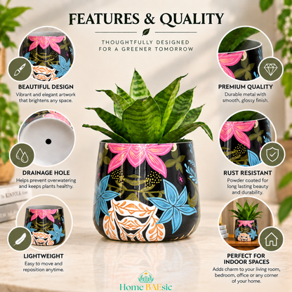 A Floral Fantasy tumbler planter decorative metal planter with a colorful floral print, callouts around it, highlighting rust resistant, lightweight, drainage hole and premium quality. The planter has a black base with pink, blue, orange, and yellow floral artwork and a green plant inside.