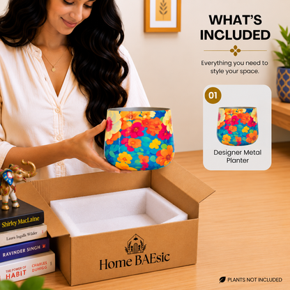 Colorful Flower Art tumbler planter from Home BAEsic displayed in hand with a matching product view in the What's Included callout.