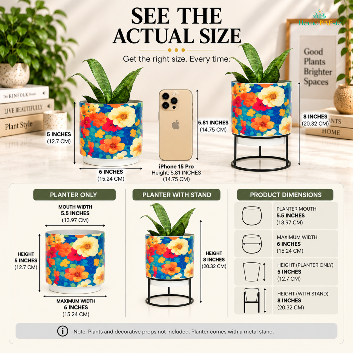 See the actual size infographic for the Home BAEsic Flower Art Tumbler Planter, showing the colorful floral planter with and without its metal stand alongside an iPhone 15 Pro for size comparison. The infographic displays a 5-inch planter height, 6-inch maximum width, 5.5-inch planter mouth, and 8-inch height with stand, with product dimension callouts and icons. Plants and decorative props are not included; planter comes with a metal stand.