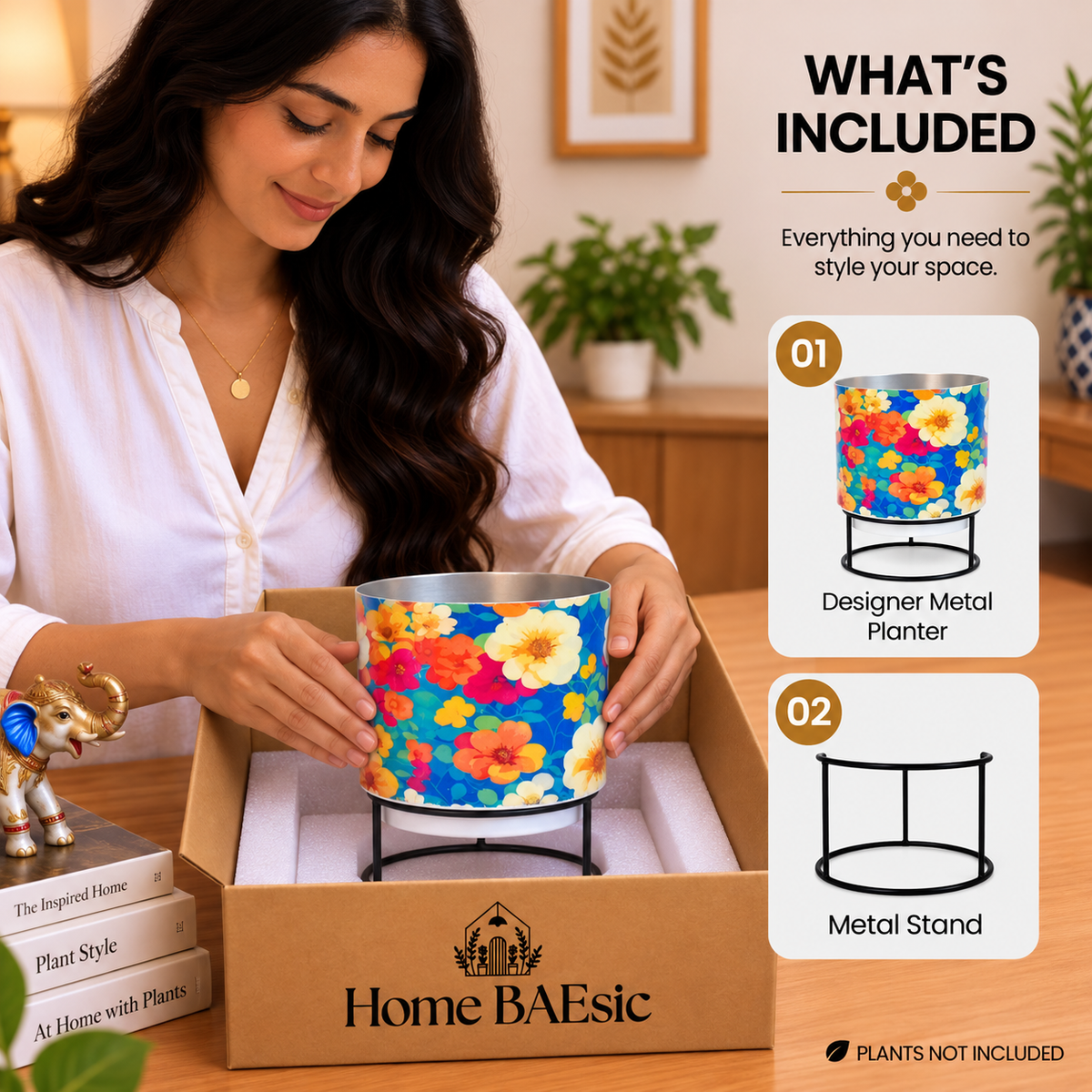 Home BAEsic Flower Art designer metal tumbler planter with black metal stand shown inside an open box during unboxing, with a woman gently touching the planter and “What’s Included” product callouts.