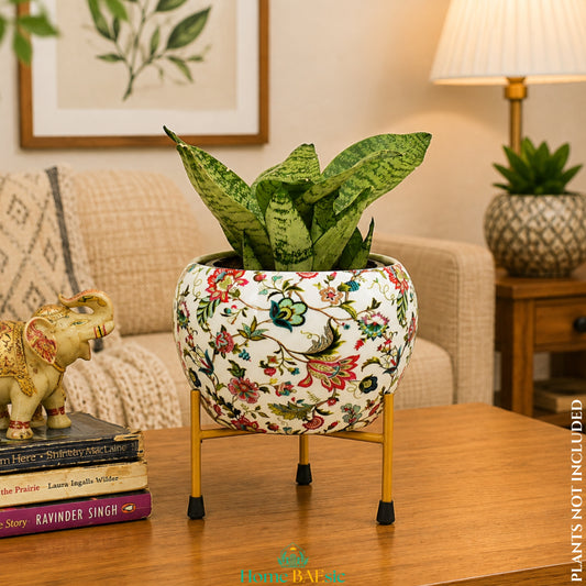 Meadow Floral Planter with green indoor plant on a golden metal stand styled in a modern living room