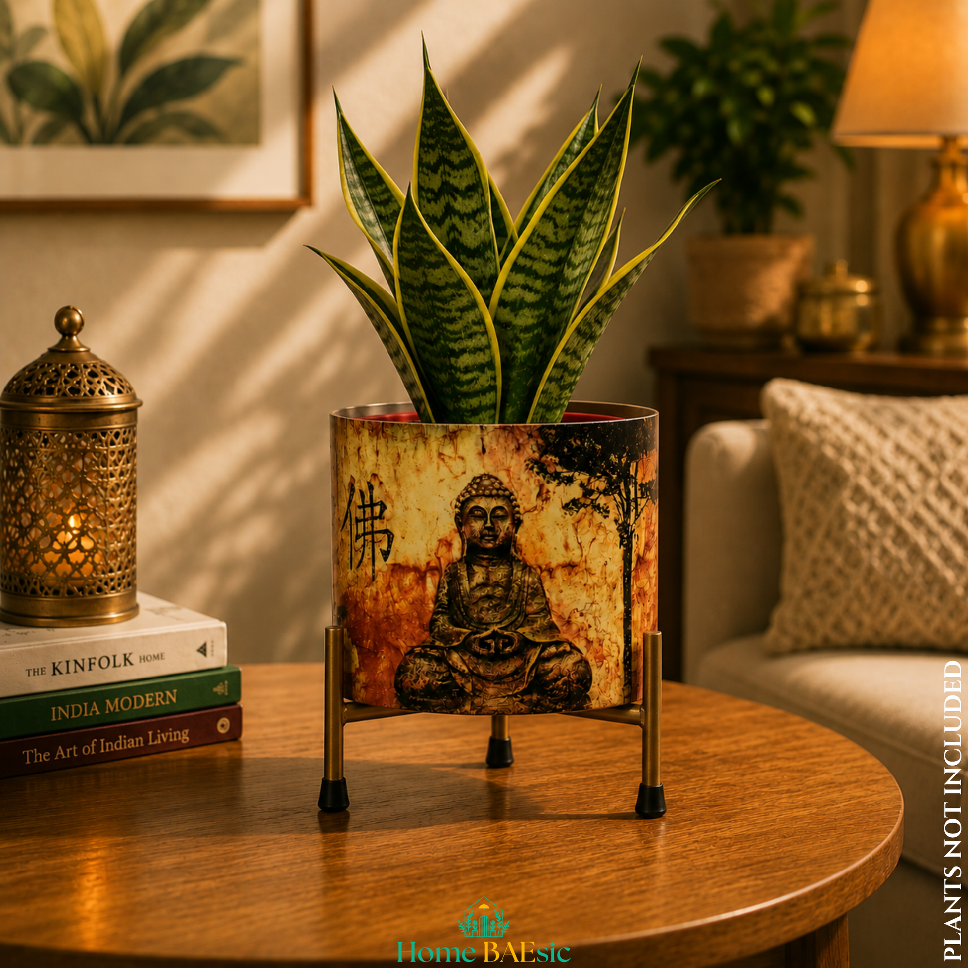 Meditating Buddha metal planter with a lush snake plant on a sturdy golden metal stand, styled as an elegant home decor accent