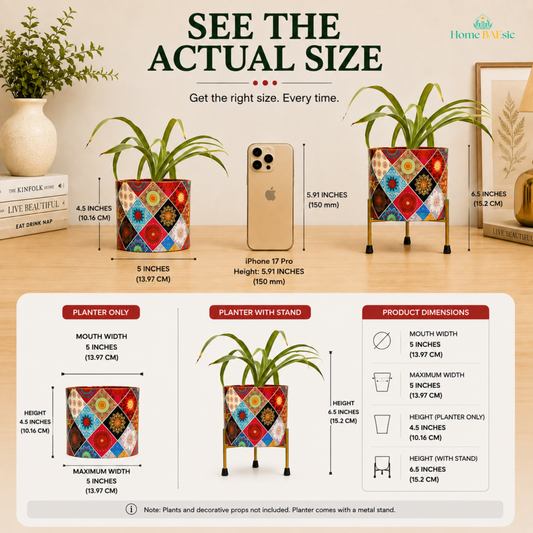 See the actual size” infographic for the Home BAEsic Multicolor Motif Planter, showing the colorful patterned planter with and without its metal stand alongside an iPhone 17 Pro for size comparison. The infographic highlights a 5-inch planter width, 4.5-inch planter height, 6.5-inch height with stand, and iPhone height of 5.91 inches (150 mm).