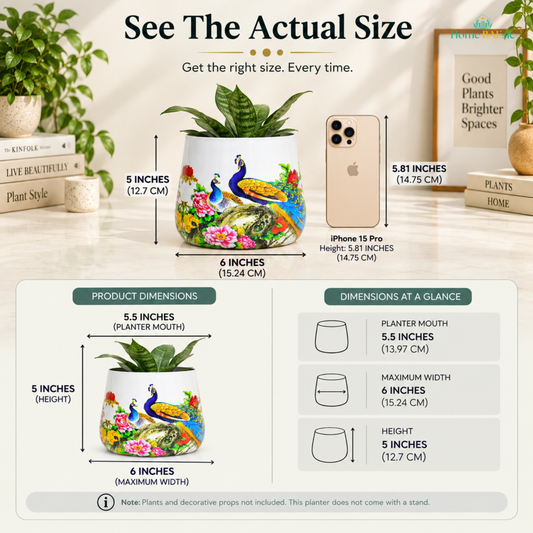Home BAEsic Peacocks in Garden Tumbler planter size comparison showing a 5.5-inch planter mouth, 6-inch maximum width, and 5-inch height alongside an iPhone 15 Pro for size reference; plants, decorative props, and stand not included.