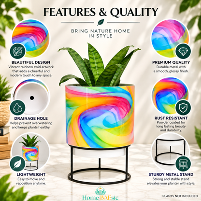 Home BAEsic Rainbow Breeze tumbler metal planter with black metal stand, featuring vibrant rainbow swirl artwork, drainage hole, lightweight metal construction, premium glossy finish, rust-resistant coating, and sturdy metal stand. Plants not included.