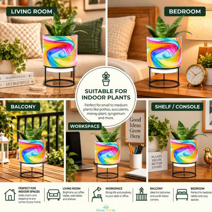 Rainbow Breeze designer metal tumbler planter with stand displayed in living room, bedroom, balcony, workspace and shelf settings, featuring vibrant multicolor rainbow swirl artwork, sturdy black metal stand and green indoor plant.