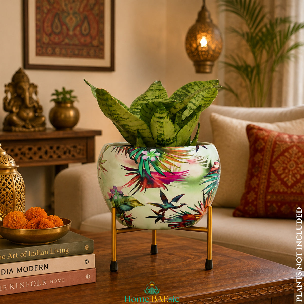 Viola designer metal planter with metal stand styled in a modern Indian living room with an indoor plant