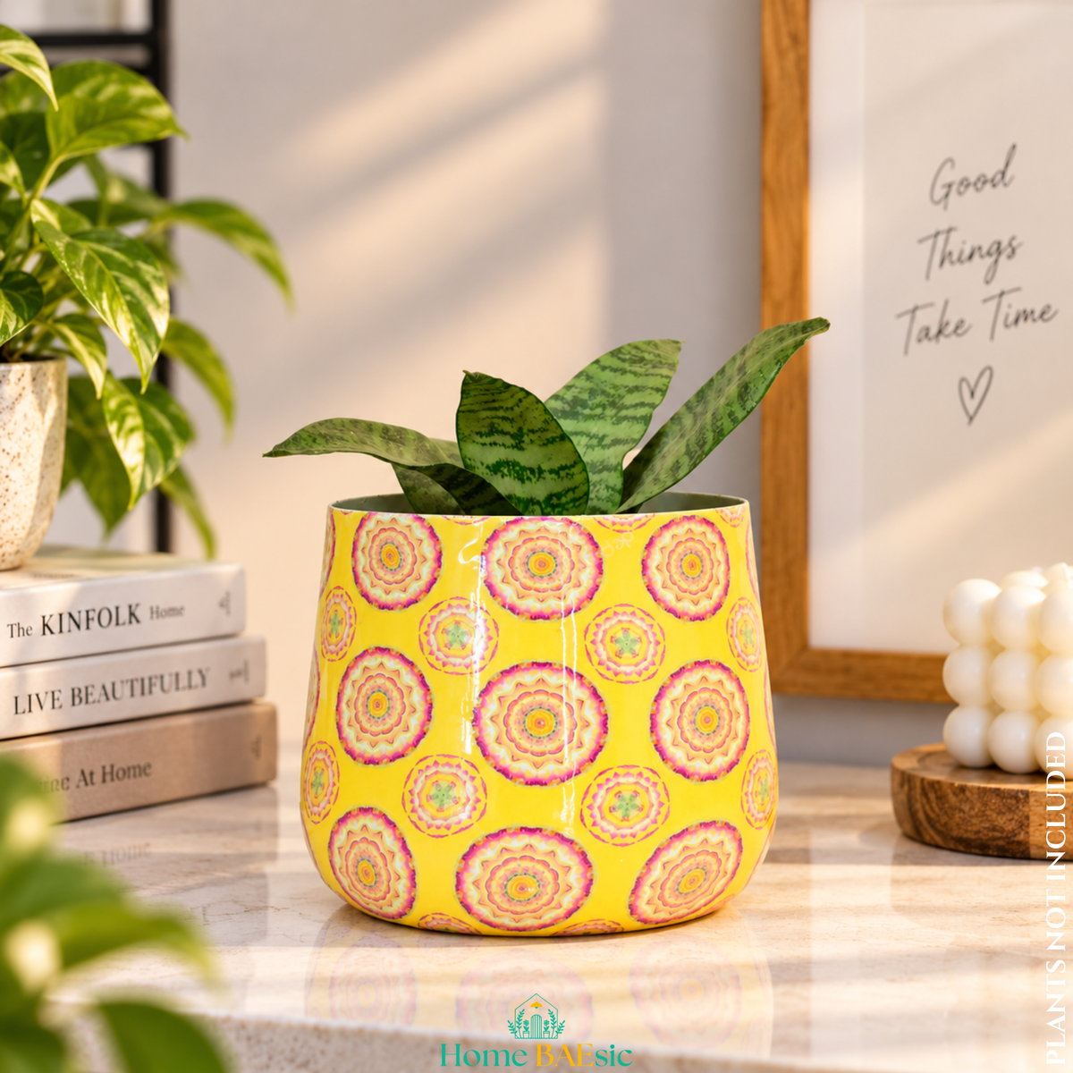 Yellow Motif tumbler metal planter styled indoors