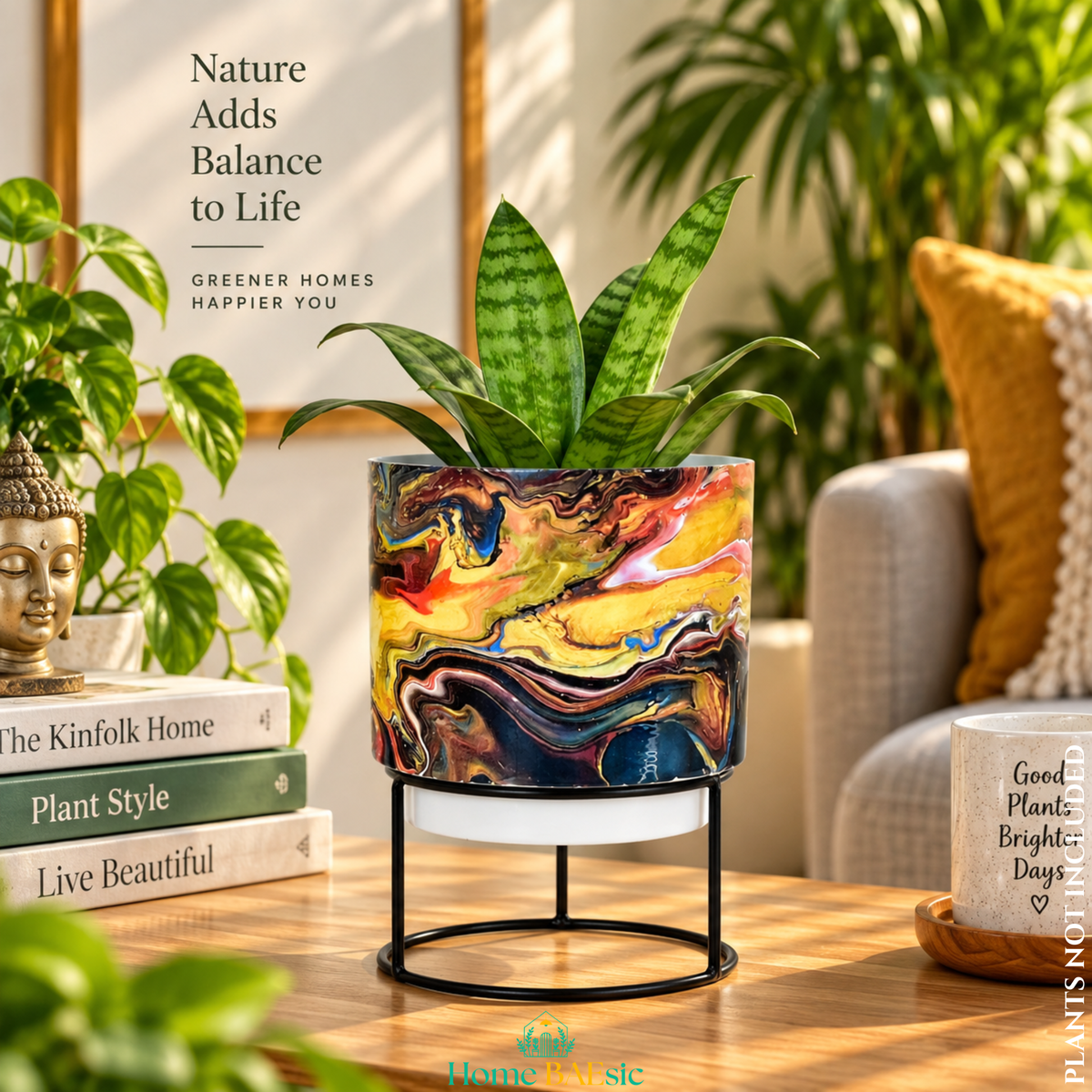 Zenia Storm designer metal tumbler planter with stand, featuring dramatic black, yellow, red, brown and blue marbled artwork with a green indoor plant.